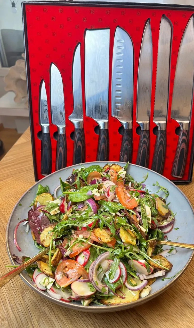 Culvaro knife set beside a prepared salad
